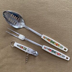 Ekco chromium plated set: produce theme bottle opener, slotted spoon, meat fork